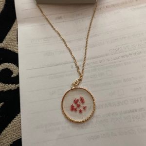 18 inch Panacea Gold chain with Floral round medallion style charm.